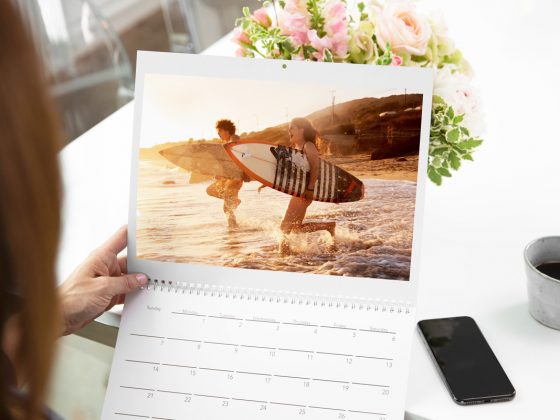 A custom calendar with two kids surfing | Motif