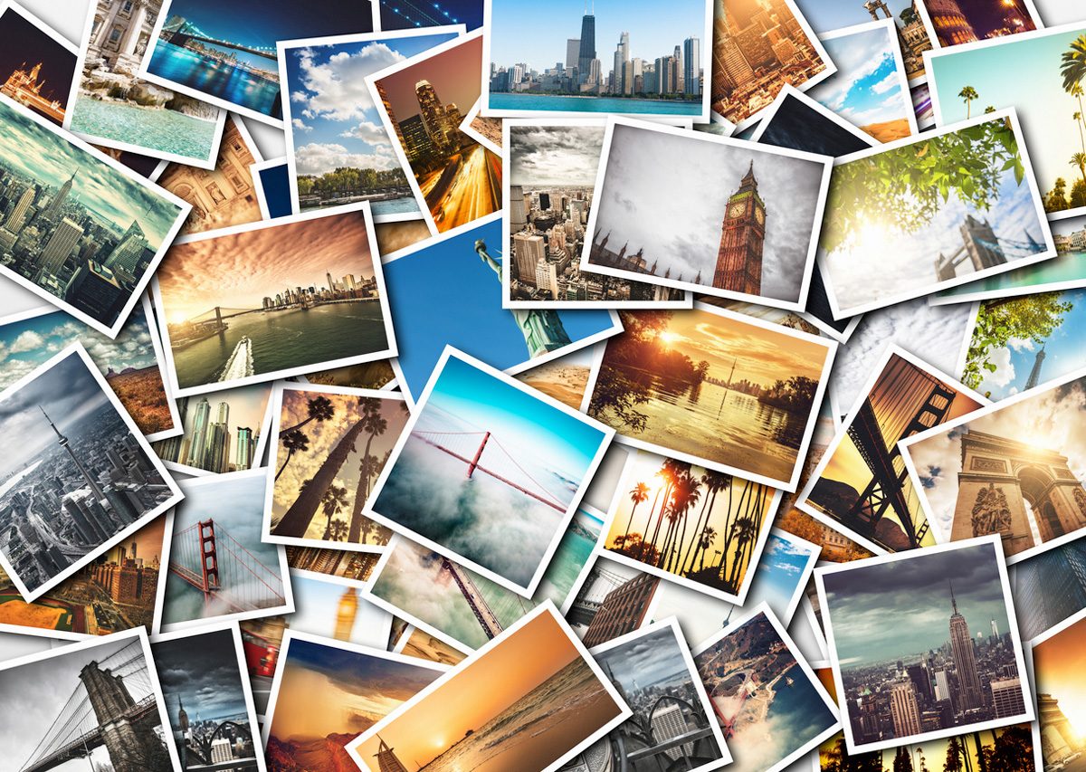 A large number of photographs on a table | Motif