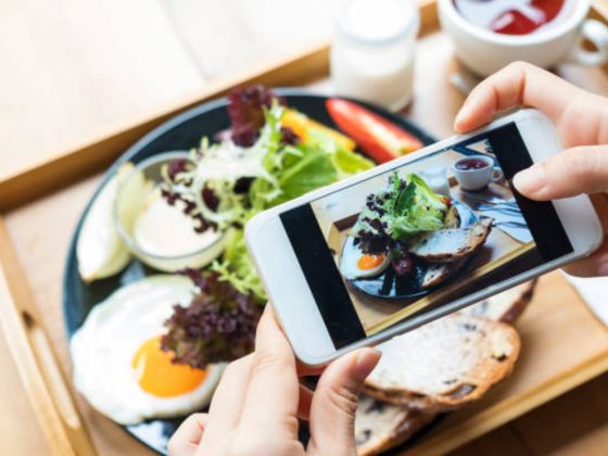 Taking a picture of a plate of food on a cell phone | Motif