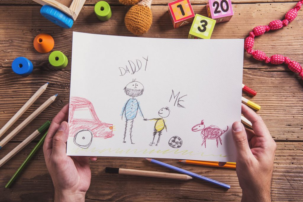 Have your little one create a message to dad and illustrate it. 