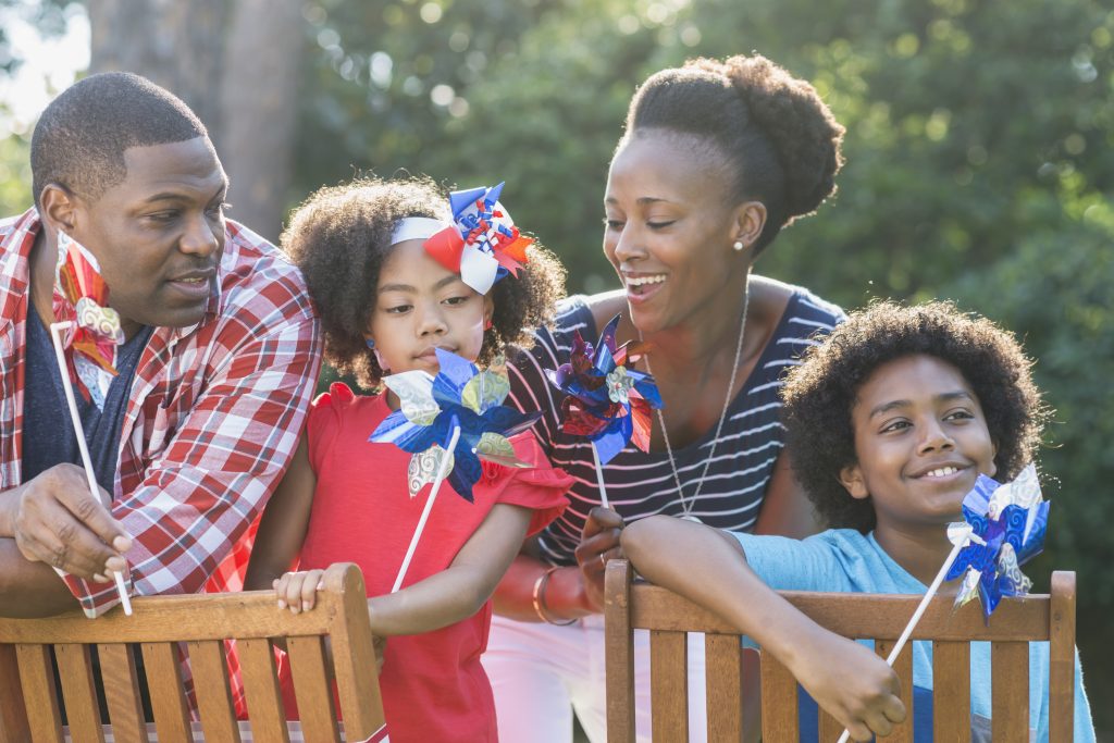 A photo of family wearing red, white, and blue is perfect for a Father’s Day photo calendar.