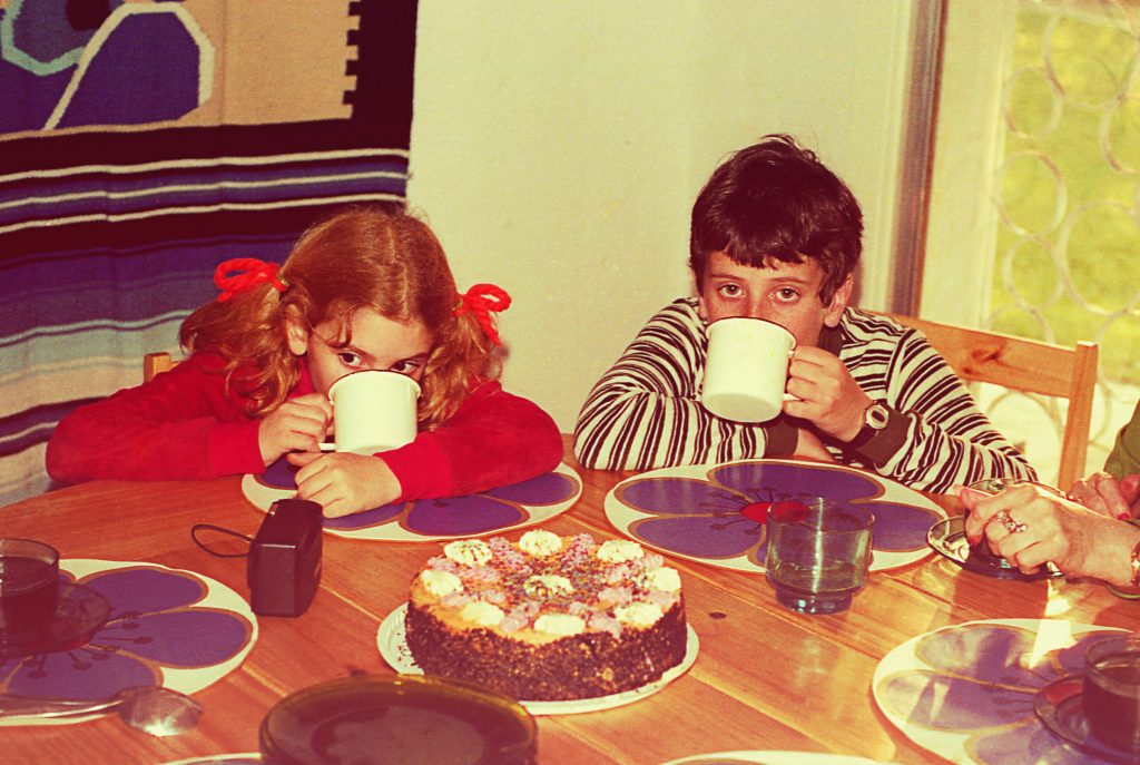 For your Father’s Day photo book, recreate memories of dad drinking hot chocolate with his sister.