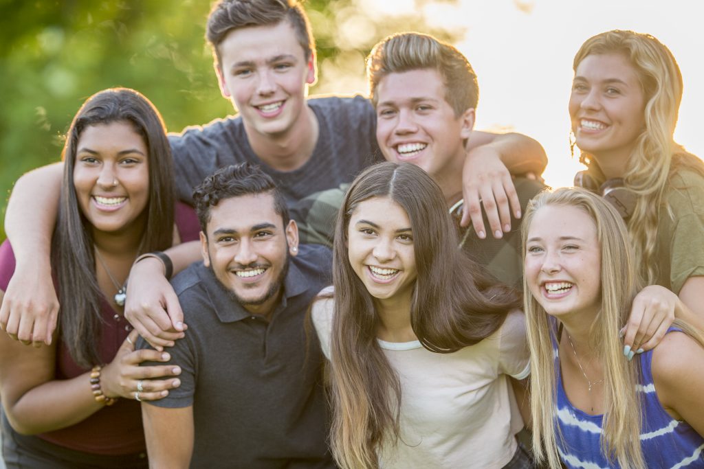A group photo of high school friends is a good focus for your personalized yearbook.