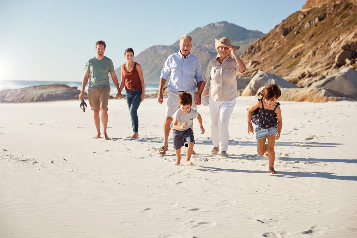 Your summer family picture can be portrait-style on the beach with multiple generations.
