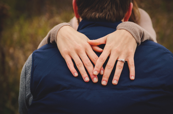 An engagement ring can be an important focal point during a photo shoot.