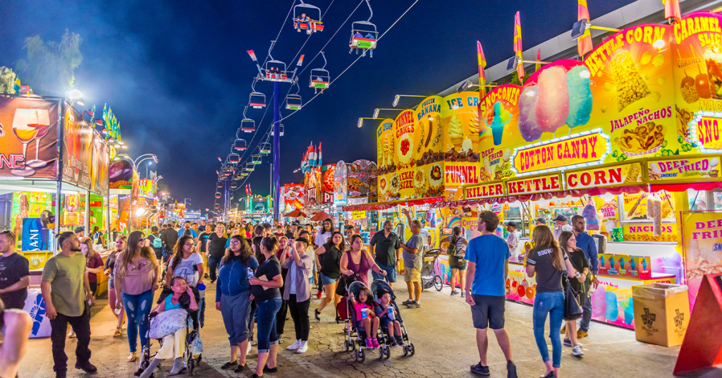 Foreground depth helps the viewer feel like they’re part of the state fair in the photograph.